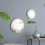 Miroir circulaire avec cadre en fer-547269136