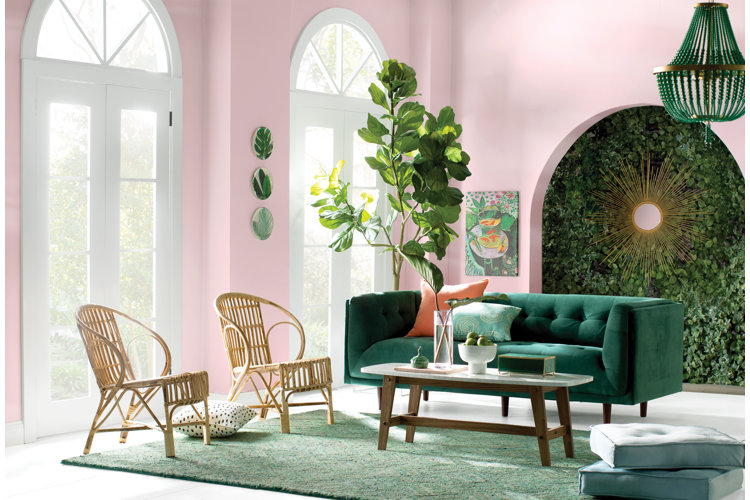 pink living room with green accent furniture
