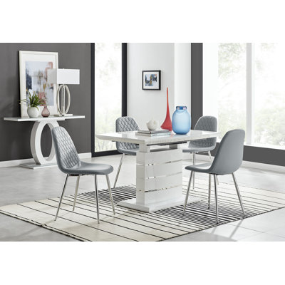 Renne Modern High Gloss Extendable Dining Table Set With 4 Luxury Faux Leather Dining Chairs