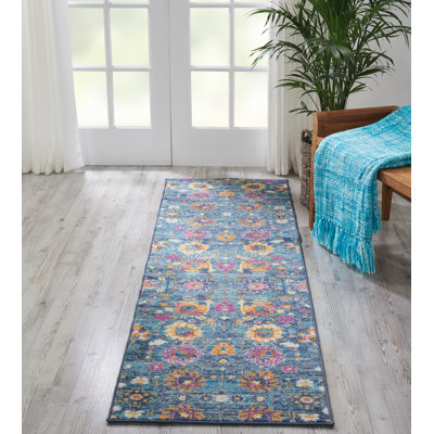 Tapis floral bleu / rose en polypropylène tissé à la machine