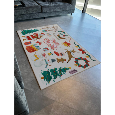 Tapis beige à motif de rennes avec motif de rennes