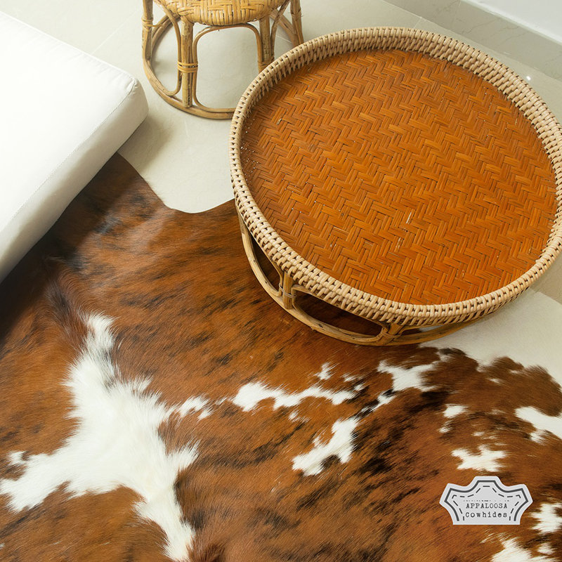 Handcrafted Medium Pile Black and Brown Cowhide Rug 5' x 7'
