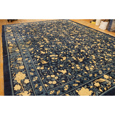 Tapis bleu antique en laine noué à la main