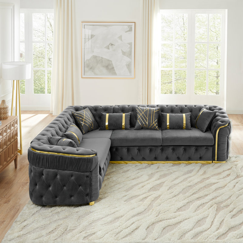 Canapé Chesterfield luxueux en velours doré satiné de luxe pour les salons élégants