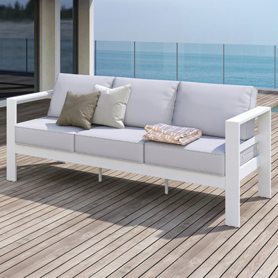 Arnhildur Bolanle 76" Wide Outdoor Patio Sofa with Cushions by Wade Logan