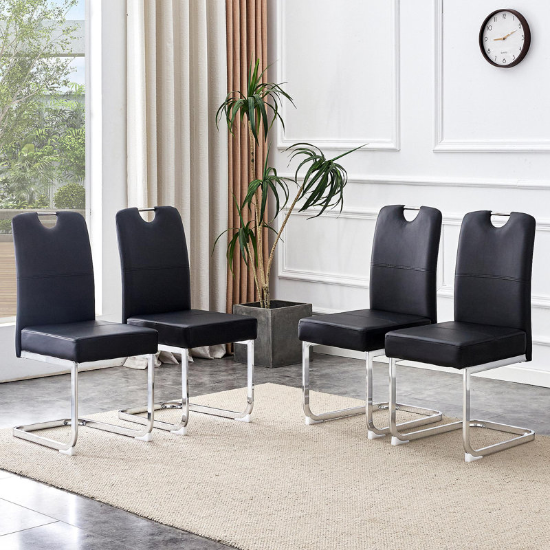 Ensemble de 4 chaises de salle à manger noires épaissies avec ensembles de ressorts intégrés et conception ergonomique - alliant confort et élégance, avec des dimensions de produit de 15,7 x 20,5 x 38,2 pouces.