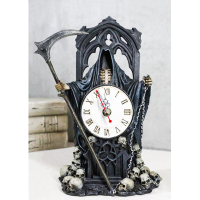 Figurine noire horloge de table