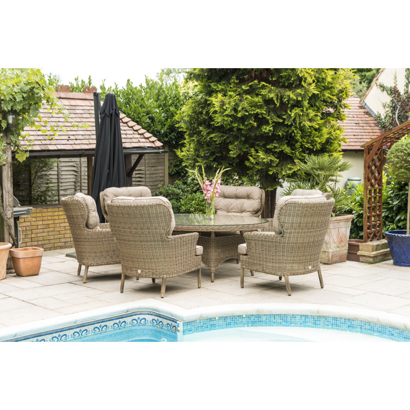 Raeburn 6 - Person Patio Dining Set Oval Table with Cushions Included, Taupe, Natural