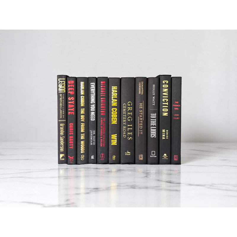 Étude de livres décoratifs noirs (au pied)
