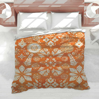 Édredon orange à motif floral