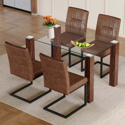 Table de salle à manger transparente en verre trempé avec pieds en panneau de fibres à densité moyenne, jumelée à 4 chaises