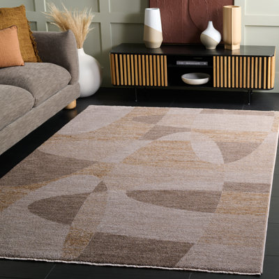 Tapis Lasa 102 en taupe / or