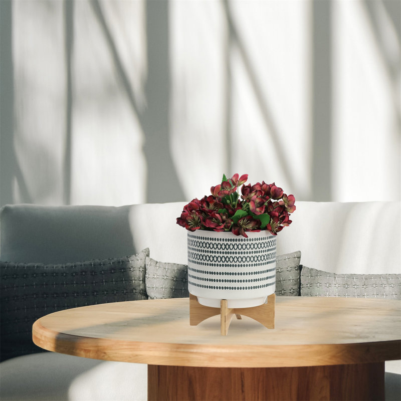 Élégante jardinière en céramique avec support et pois, un ajout élégant et fonctionnel à votre maison ou votre jardin