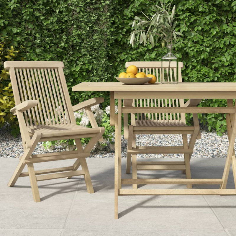 Chaise de patio pliante en teck