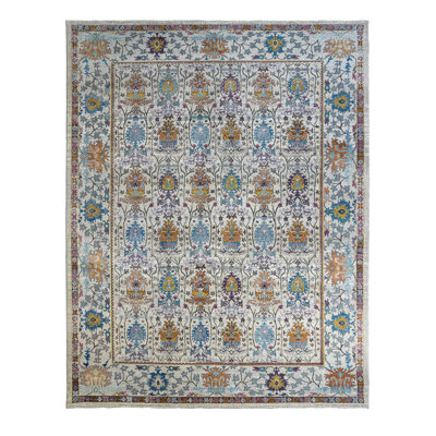 Tapis ivoire à bordure multicolore à motif floral marocain Isabella Radnar