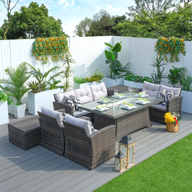 Bozhan 7 - Person Patio Dining Set with Rectangular Table , Cushions Included