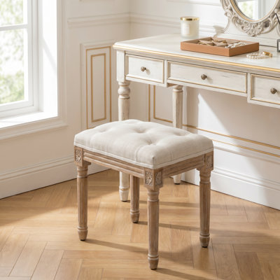 Maquillage de tabouret d'appoint avec revêtement en lin et pieds sculptés en bois massif