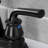 Kingston Brass Restoration Two-Handle 3-Hole Deck Mount 4" Centerset Bathroom Faucet with Plastic Pop-Up-66069160