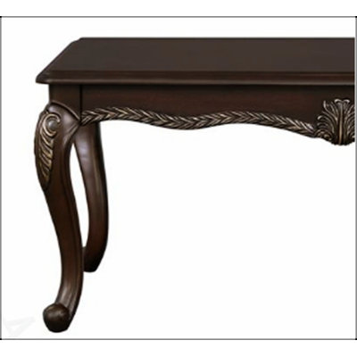 Pierce Cherry Finish Coffee Table with Intricate Floral Trim and Robust Construction, Perfect for Elegant Living Rooms.