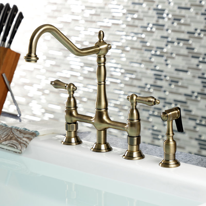 Kingston Brass Heritage Two-Handle 4-Hole Deck Mount Bridge Kitchen Faucet with Brass Side Sprayer, Vintage Brass