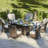 Carshalt 6 - Person Wicker Patio Dining Set with Oval Table , Cushions Included