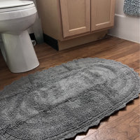 August Grove Lisk Oval 100% Cotton Solid Bath Rug Size: 17 W x 24 L, Color: Gray