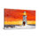 Phare de Noël au coucher du soleil avec une couronne de Noël