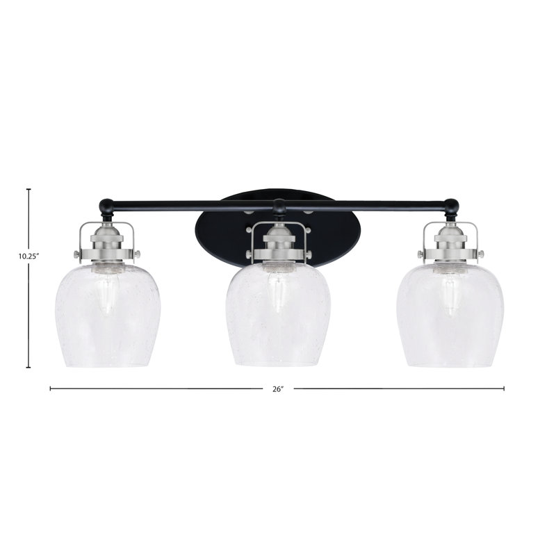 Applique murale Easton à 3 lumières, offerte en noir mat et nickel brossé, avec verre bullé transparent de 15 cm.