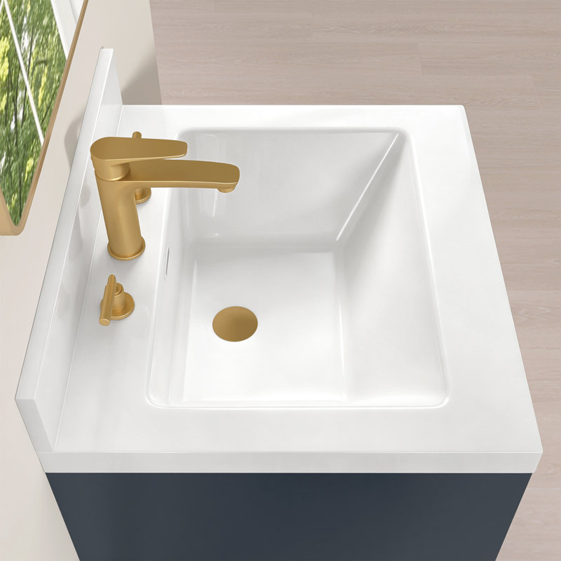 Plan de toilette en surface solide de 61 cm (L) x 53 cm (P) avec lavabo central intégré, dosseret de 9 cm, robinet à 3 trous et entraxe de 20 cm.