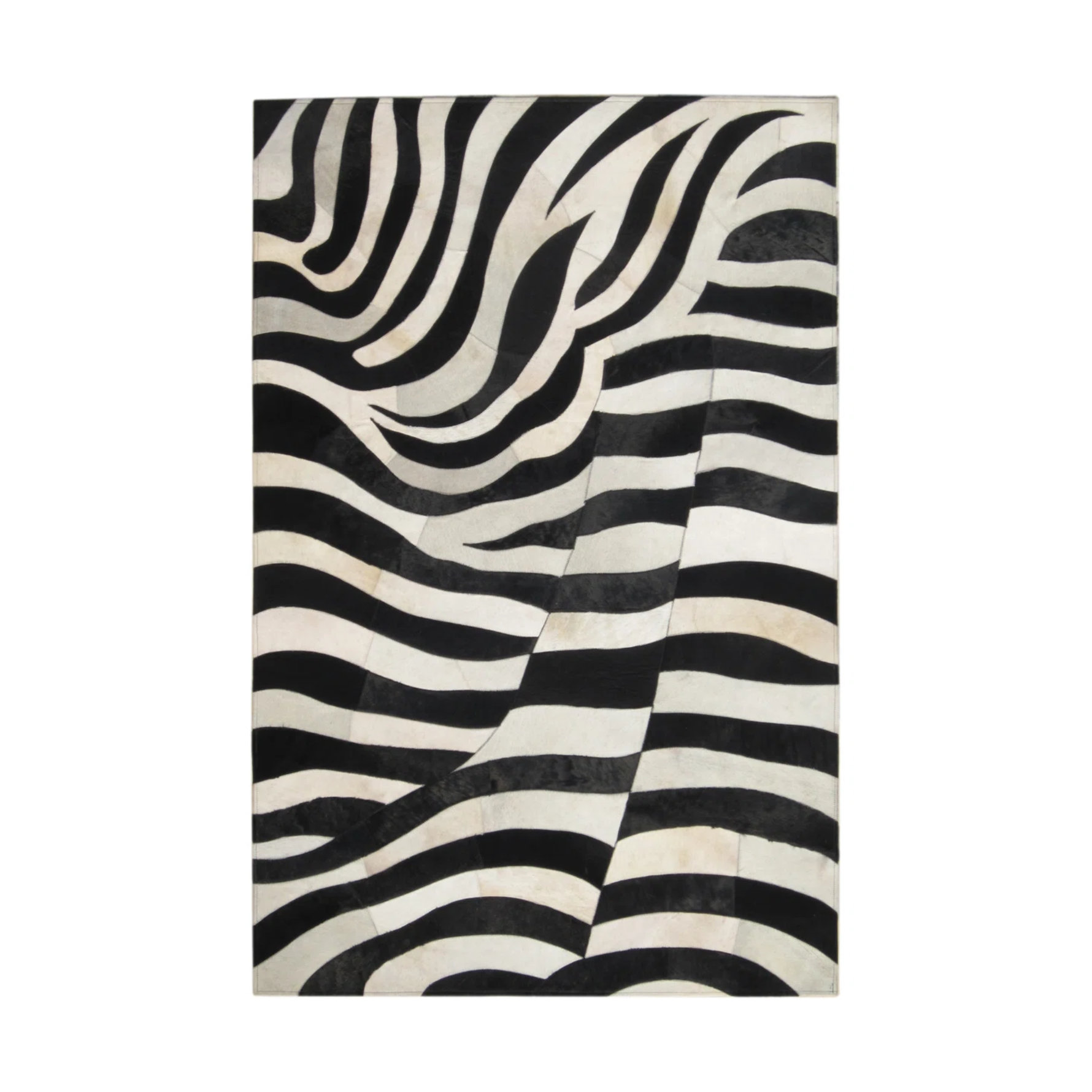 A rug with a black and white zebra stripe pattern.