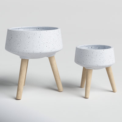 Set of 2 Resin and Magnesia Planters with Beech Wood Stands - Modern Elevated Indoor Outdoor Decorative Plant Holders for Stylish Display.