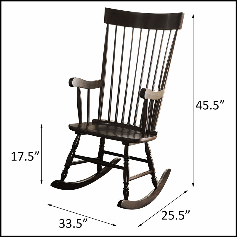 Chaise berçante noire à dossier fuselé avec chaises berçantes arrondies, combinant élégance classique et confort moderne pour toute maison