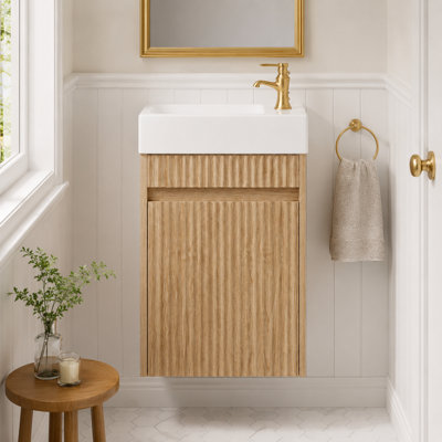 Meuble-lavabo suspendu de 40,6 cm (16 po) avec lavabo réversible en SMC, façade cannelée ondulée, porte à ouverture par simple pression et fermeture en douceur pour petites salles de bain