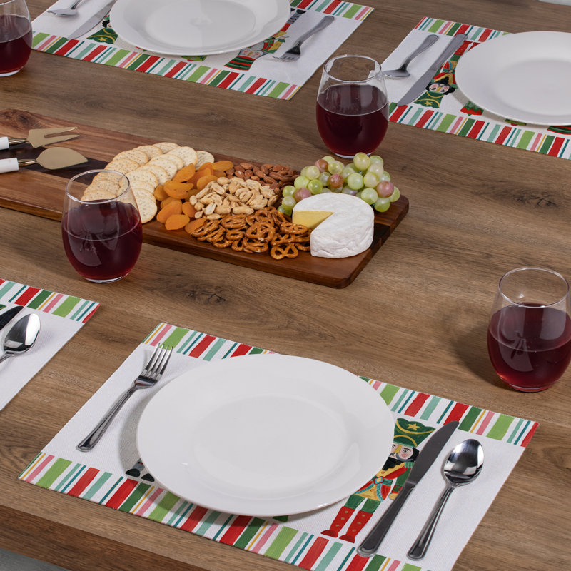 The Holiday Aisle® Nutcrackers 4-Pack Cotton Blend Rectangular Placemats