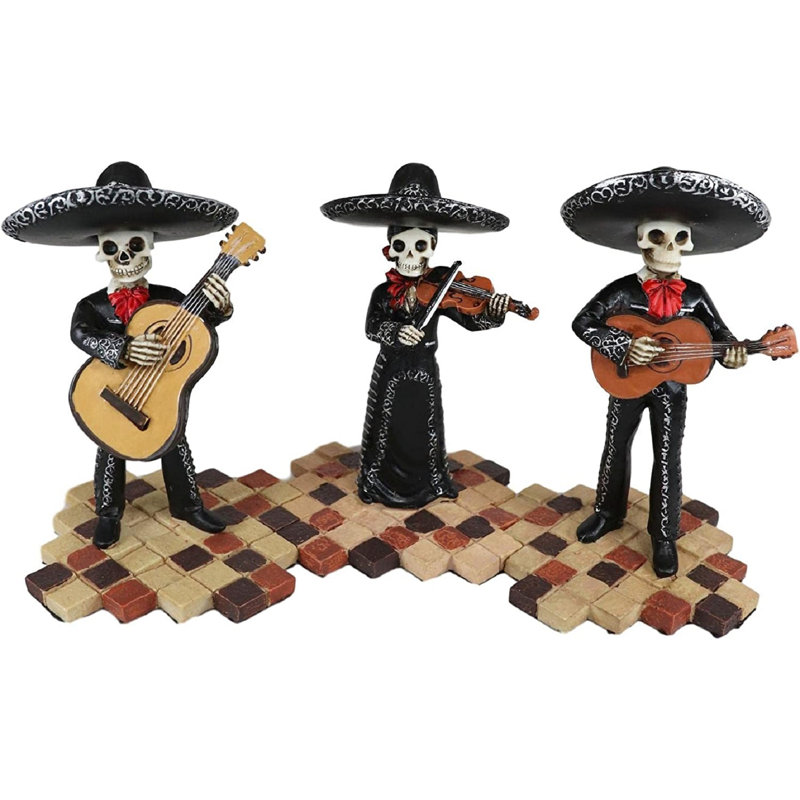 Figurine de guitare et violon squelette