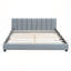 Grand lit plateforme tapissier en similicuir