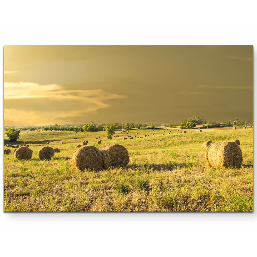 Leinwandbild Heuballen auf einem Feld in der Toskana