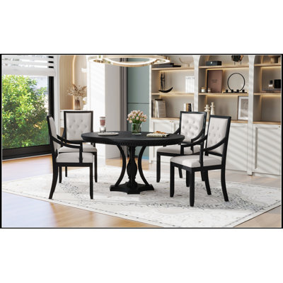 Ensemble de table de salle à manger extensible ronde avec quatre chaises pour des solutions de mobilier de cuisine et de salle à manger polyvalentes