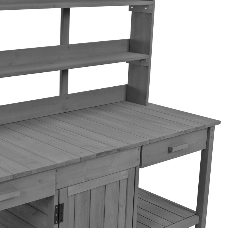 Banc de jardin en pot gris avec tiroirs, armoire et table basse en bois gris
