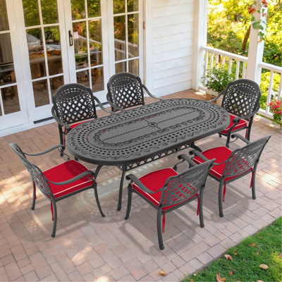 7-Piece Set Of Cast Aluminum Patio Furniture With Red Cushions