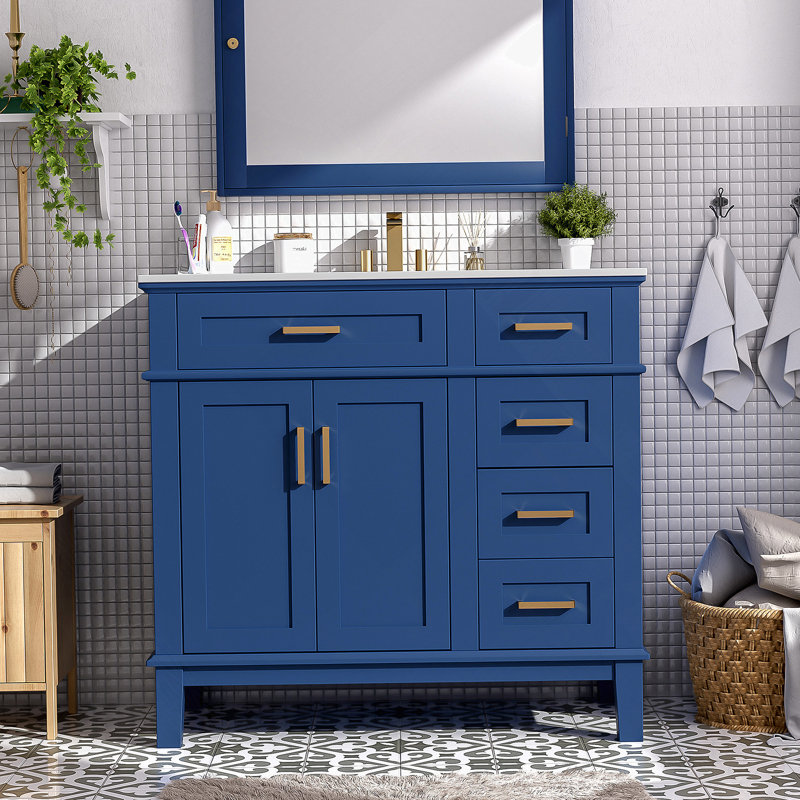 Meuble-lavabo moderne avec lavabo en céramique, portes à fermeture douce, tiroirs multiples pour le rangement, idéal pour les petites salles de bain et la vie organisée