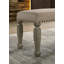 Banc rembourré à têtes de clou