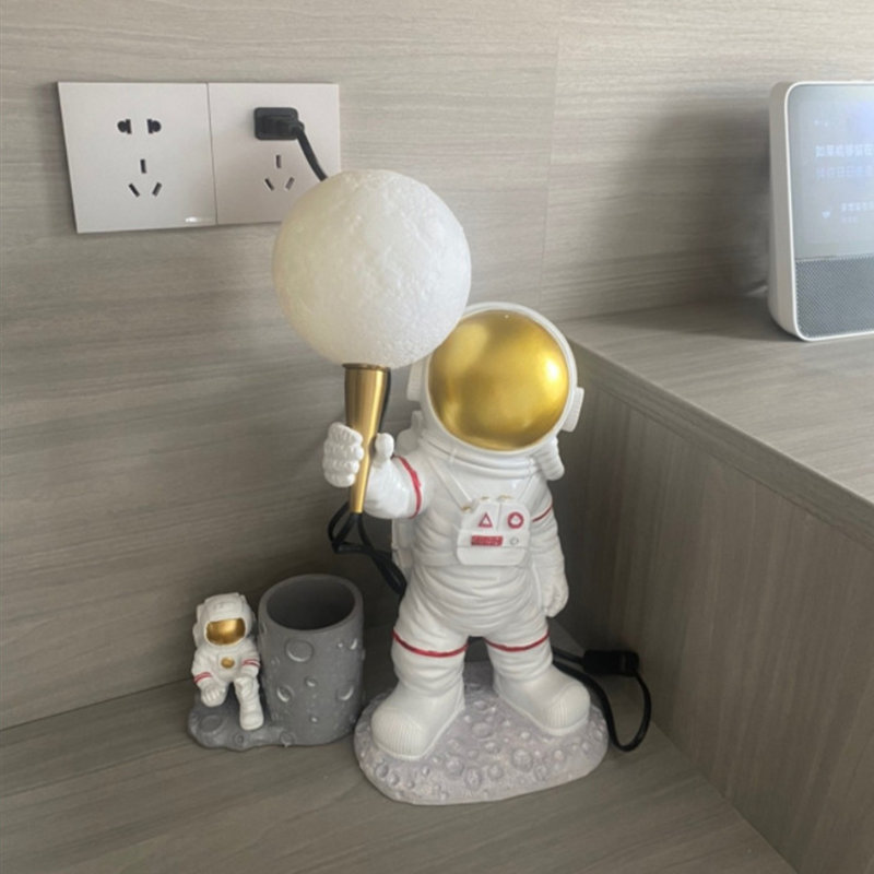 Lampe de table astronaute en résine avec lumière DEL