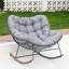 Chaise berçante d'extérieur en métal avec coussins