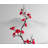 Arrangement de fleurs de prunier dans un vase-743745665
