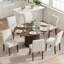 Ensemble de table de salle à manger moderne extensible pour 4 à 11 personnes avec rangement caché, table convertible ronde à ovale et chaises rembourrées en tissu-133948229-133948227