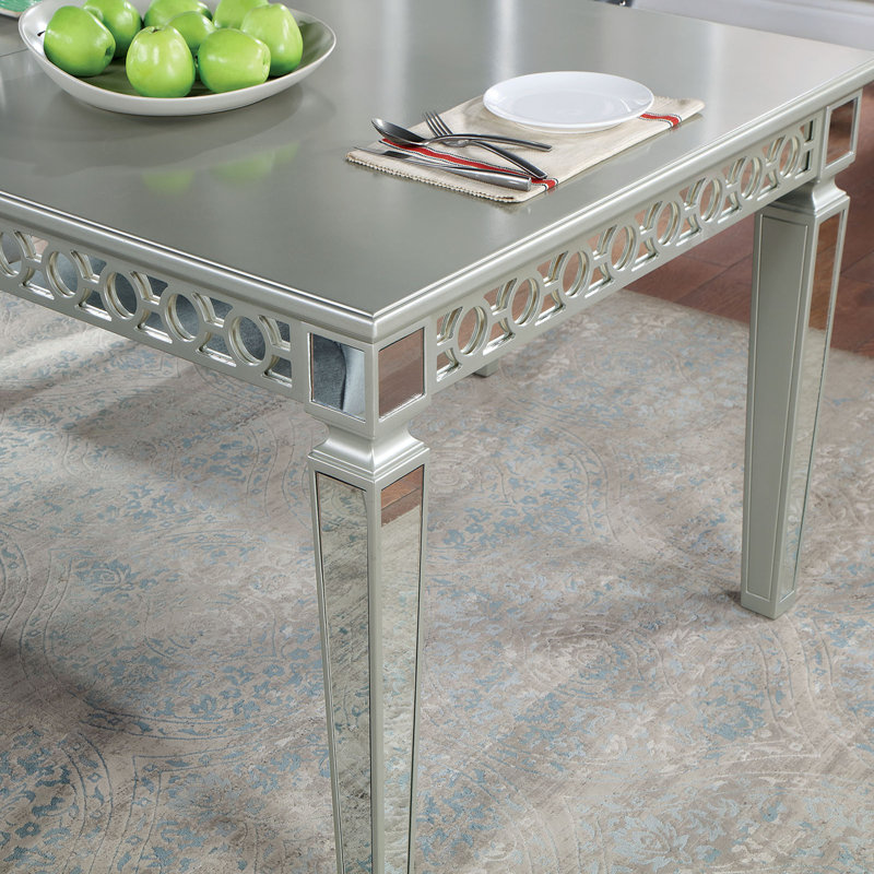 Table de salle à manger avec miroir décoratif à feuilles