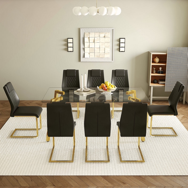 Ensemble de table et de chaises. Table de salle à manger rectangulaire. Plateau de table en verre trempé, pieds de table en métal dorés à 7 formes.
