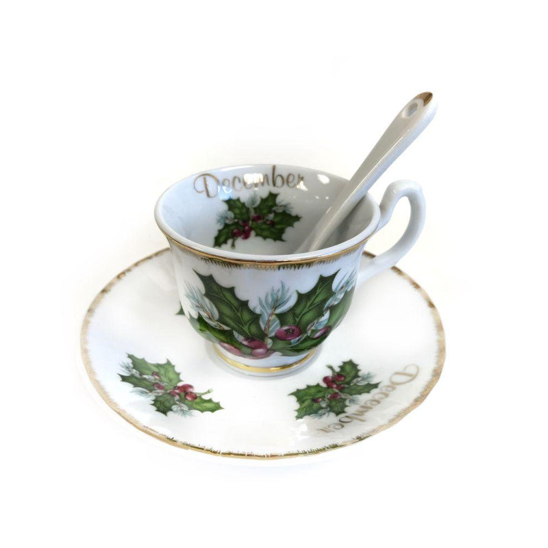 Ensemble de tasse à café et soucoupe décembre
