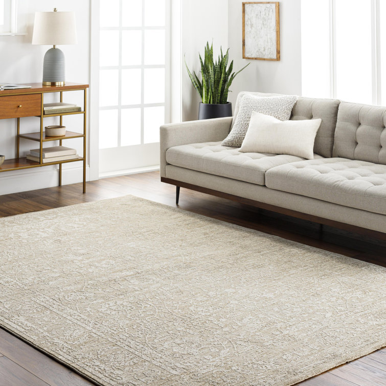 Quach Machine Woven Polyester Area Rug in Cream